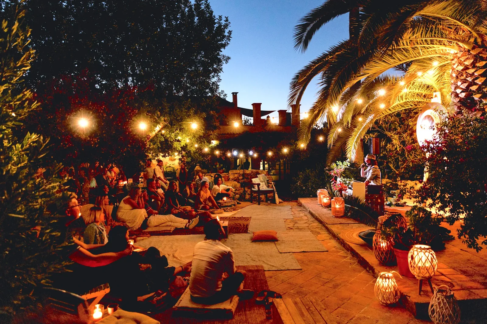 Private concert at night — lanterns and grand piano